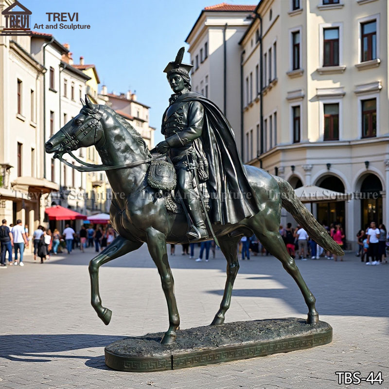 Life-size bronze equestrian statue positioned as the focal point of an estate entryway