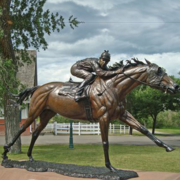 Antique bronze Jockey on a racehorse statue made for outdoor park